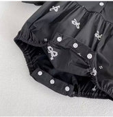 Black Peter Pan Collar Romper.